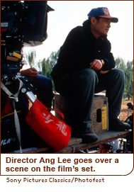 Director Ang Lee goes over a scene on the film’s set.