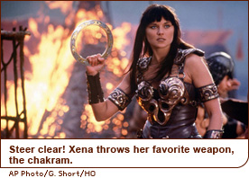 Steer clear! Xena throws her favorite weapon, the chakram.
