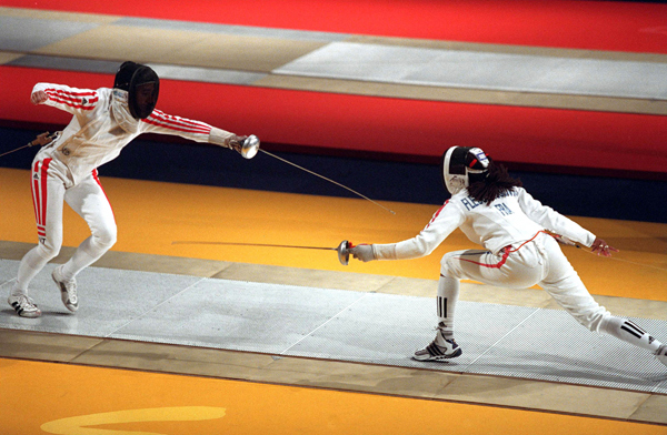 Frances Valerie Barlois and Austrias Andrea Rentmeister battling at the 2000 Sydney Olympics