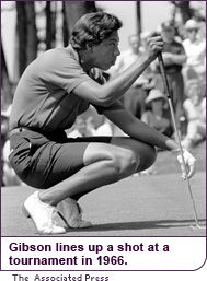 Gibson lines up a shot at a tournament in 1966.