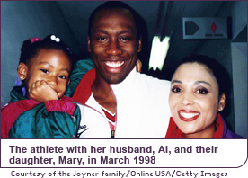 The athlete with her husband, Al, and their daughter, Mary, in March 1998