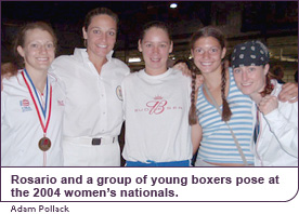 Rosario and a group of young boxers pose at the 2004 women's nationals.